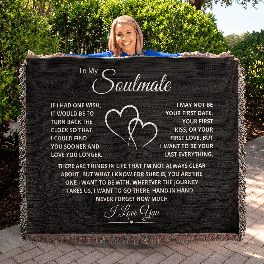 Cozy heirloom woven blanket on black background with romantic Last Everything message, perfect for special occasions.